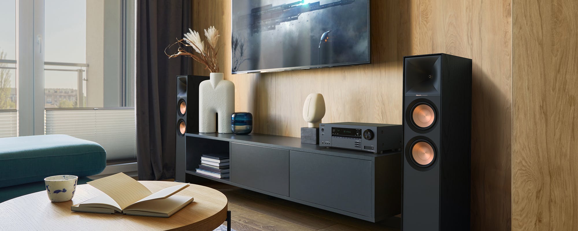 Onkyo TX SR3100 DAB AVR and Klipsch R 600 F speakers in modern living room against wood wall 2000x800