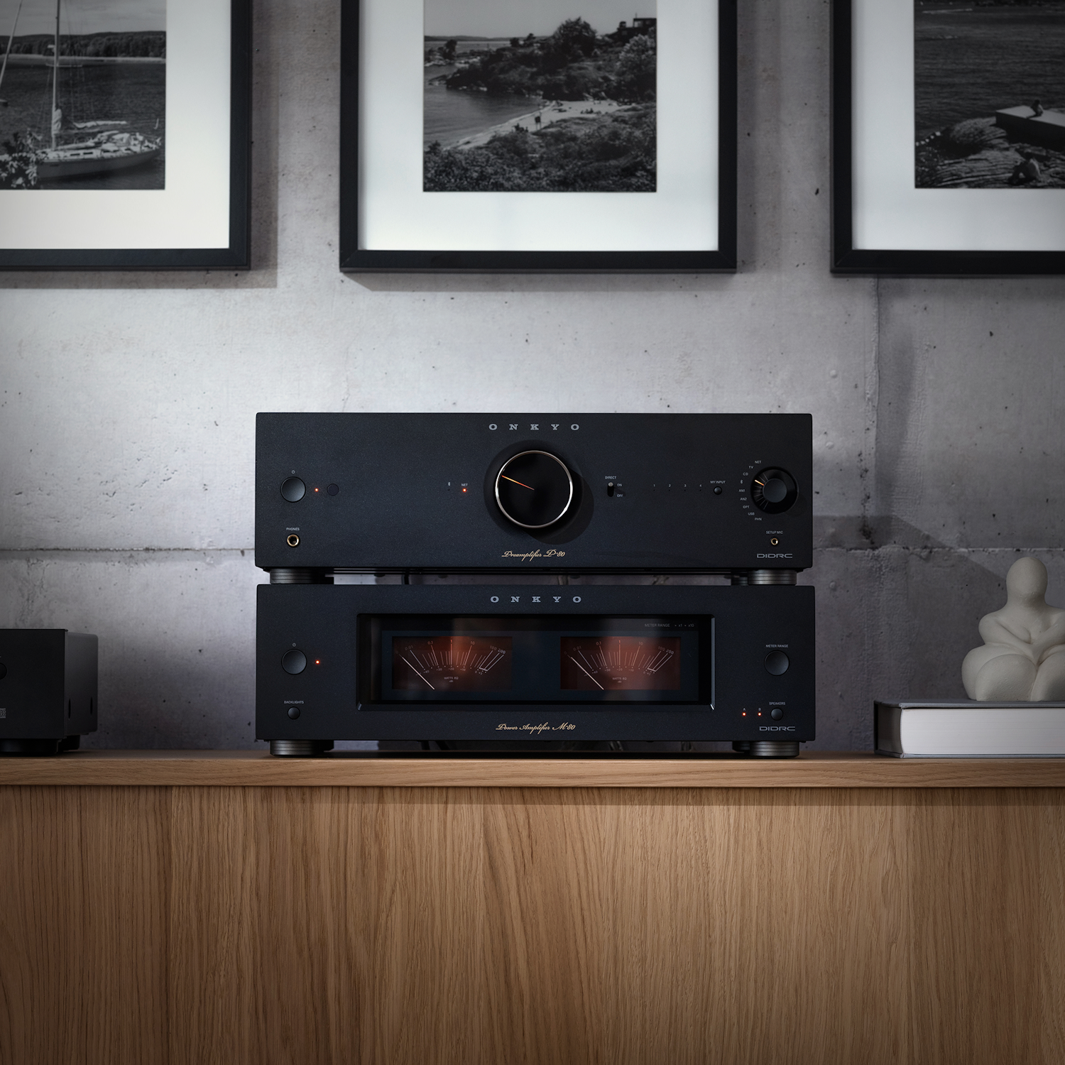 Onkyo Icon P 80 and M 80 black stacked beside small marble sculpture in listening room 2000x2000