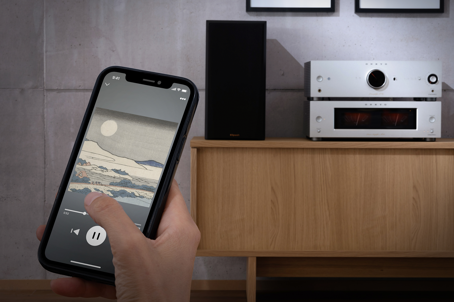 Onkyo Icon P 80 M 80 with phone controlling music in foreground 2000x1333